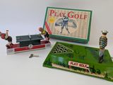 a box of play golf and a toy train on the table