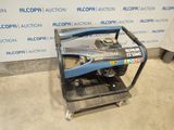 an image of a small portable generator in a garage