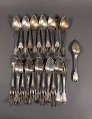 a lot of silver spoons and spoon spoons on a table