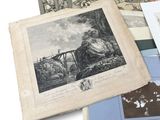 an assortment of old books with pictures of people and animals