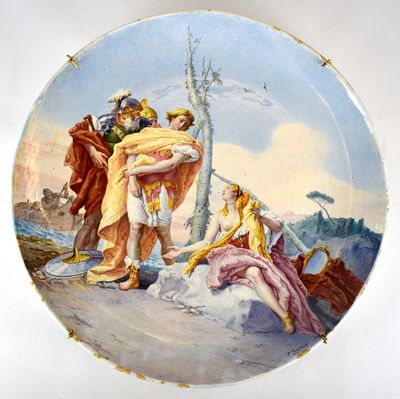 une assiette sur laquelle est représenté un homme et une femme