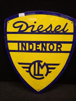 un gros plan d'un panneau jaune et bleu sur fond noir