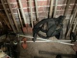 a picture of a backpack and a pair of tools in a room