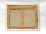 an old picture of a picture frame with a piece of paper attached to it