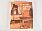 a book with a picture of a bed and a table