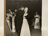 an old photo of a couple dancing on a dance floor