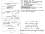 un gros plan d'un document sur lequel figure la photo d'une personne