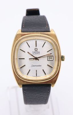 an image of a close up of a wrist watch on a white surface
