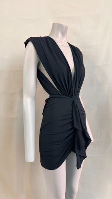 the mannequin is wearing a black dress with a knot around the waist