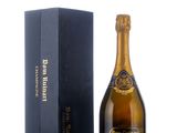 a bottle of champagne in front of a black box