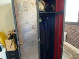 an image of a metal locker in a room