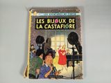 livre pour enfants français « Les Bijoux de la Castafiore », avec l'illustration d'une femme en robe rouge
