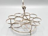 sterling silver plated ring holder with a bird on top