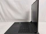 a laptop that is sitting on a white surface