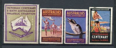 four stamps of different countries are displayed on a black surface