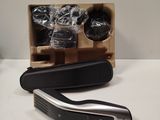 a black and silver hair clipper sitting on a table