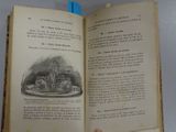 an open book with a picture of a plate of food on it