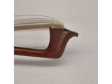an open book sitting on top of a wooden table