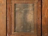 a picture of a wooden frame with a mirror in it