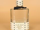 an image of a bottle of cologne on a table