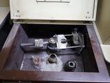 a metal sink that has a wren inside of it