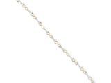 a gold and silver bracelet with a diamond design on a white background