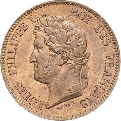 a close up of a coin with a woman ' s head on it