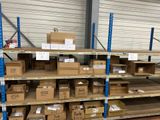 boxes are stacked on shelves in a warehouse with boxes on them