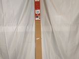 an empty cardboard box sitting on top of a white sheet