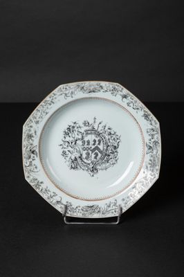 a white plate with a black and white design on it