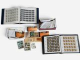 a lot of stamps in a book on the table