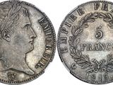 a close up of a coin with a woman ' s face on it