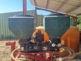 two tanks that are sitting next to each other on a cart