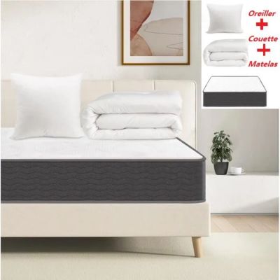 une image représentant un lit avec un matelas et des oreillers posés dessus