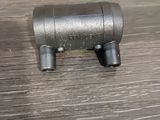 a small metal object on a wooden table
