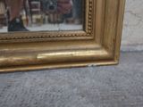 a reflection of a person in a mirror on the ground