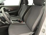 the interior of a car with two rows of seats and a steering wheel