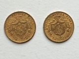 two gold sovereigns, one with a crown and the other with a crown on it