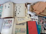 many different types of stamps on the pages of a book
