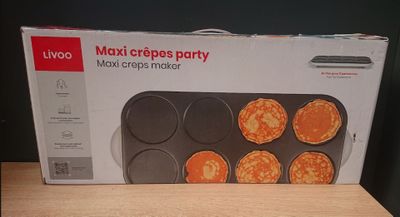 packaging of a muffin pan on a table with a box of muffins in the background