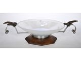 an image of a glass bowl on a wooden stand