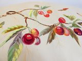 a painting of cherries on a table with leaves