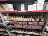 many boxes and files on the shelves in the store