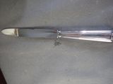 a knife that is laying on the seat of a car