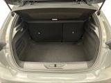 a trunk of a car with a luggage bag in the trunk