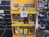 a display of food items in a store with bicycles in the background