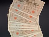 five old german bank notes stacked on top of each other