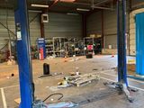 an image of a car being worked on in a garage