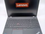 the lenovo laptop is open and ready to be used