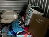 a pile of stuff in the back of a truck